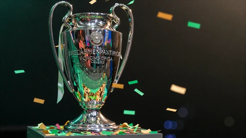 Champions-League-Pokal mit Konfetti auf Podest f&uuml;r Top-Quoten bei Golisimo Casino
